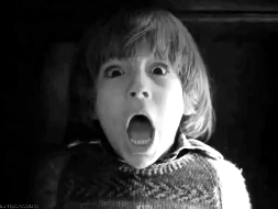Black and white flickering scared child gif